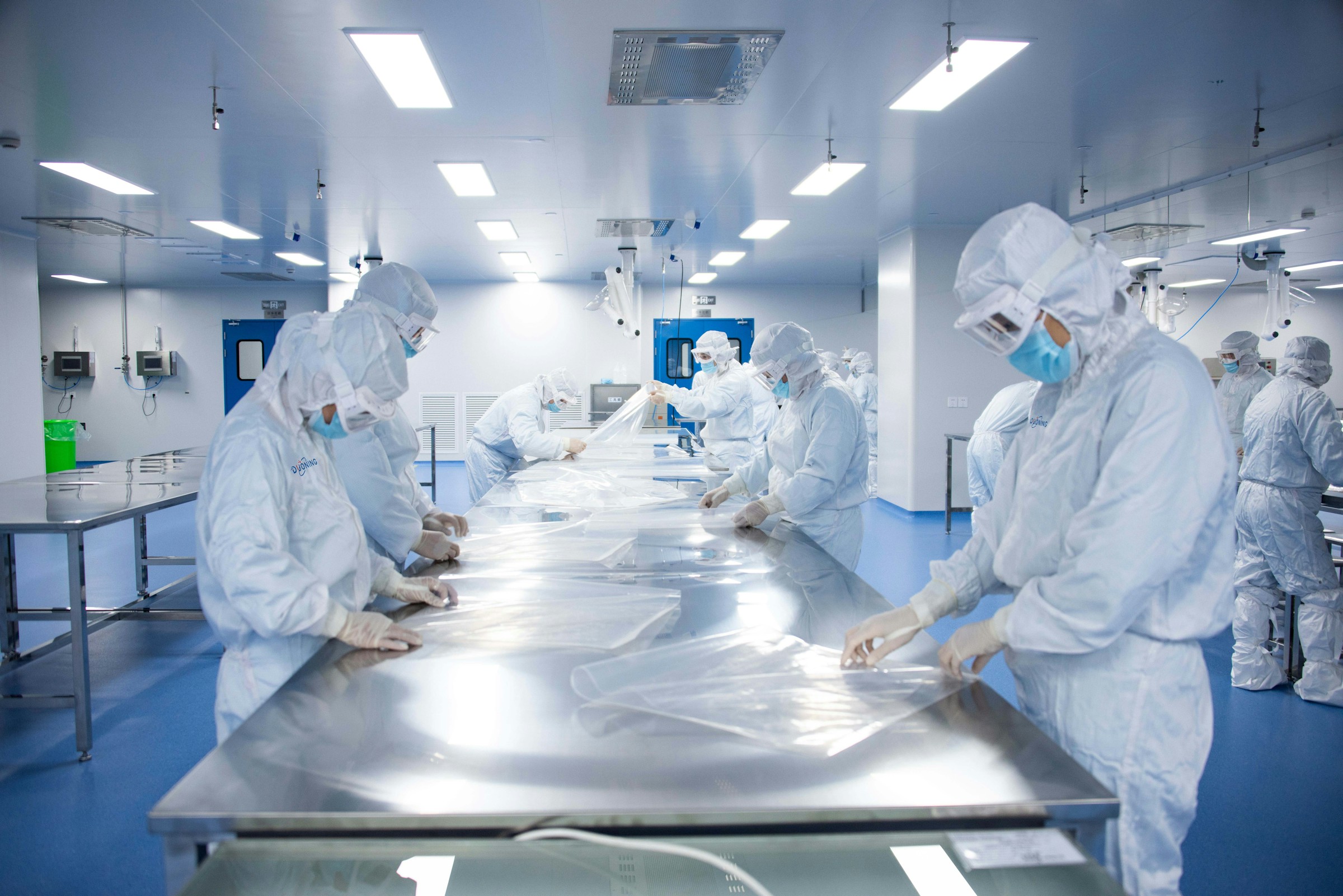 Pharmaceutical laboratory with glassware and stainless process equipment